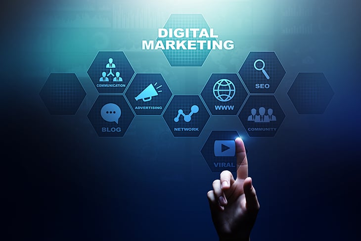 Hand tapping screen that has digital marketing tool buttons on blue background