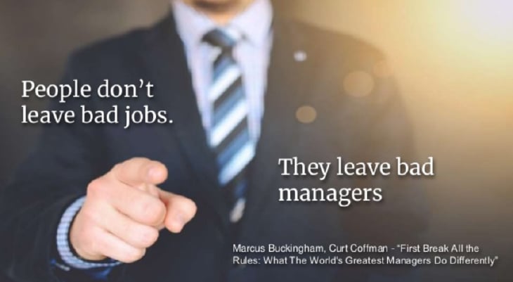 Male in suit pointing with words of "People Don't Leave Bad Jobs, They Leave Bad Managers"